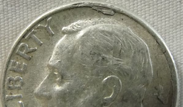 Roosevelt-Dime,-With-Cud-And-Possible-Lamination?